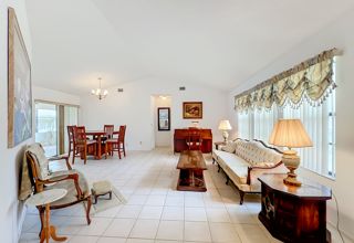 Living and dining area at 132 Oak Lake Road