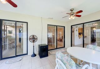 Screened porch at 132 Oak Lake Road